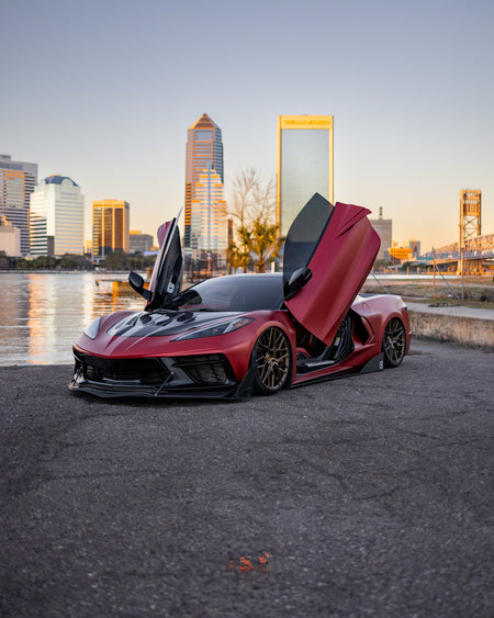 Corvette C8 Carbon Flash with Gloss Black Rohana RFX17 19 and 20 inch wheels on air ride with lambo doors