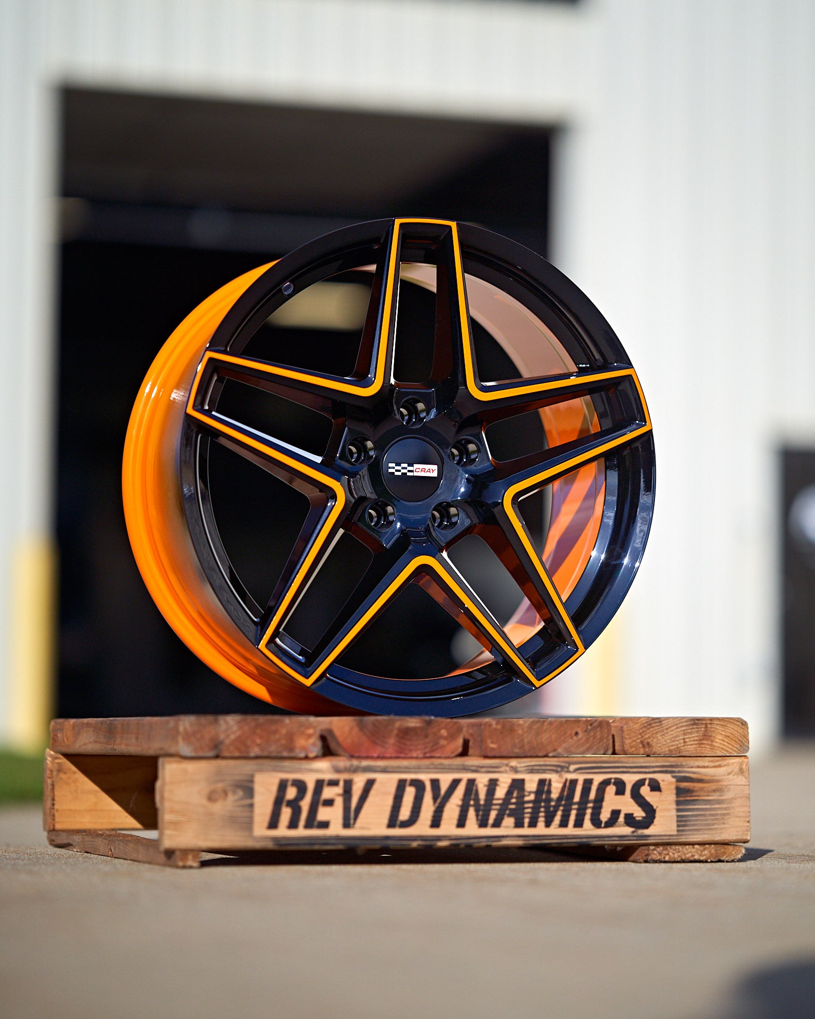 Corvette C8 Cray Panthera Rim in Amplified orange and black custom powder coat color match